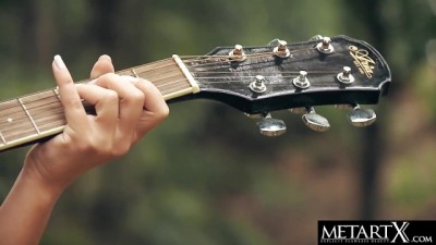 Sultry Beauty Rocks Her Guitar Before Diving Into Wet Pleasures
