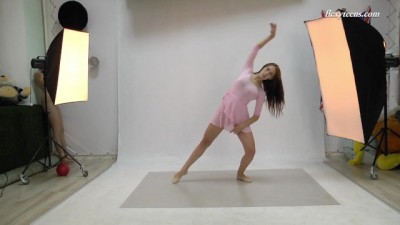 Busty Body Suit Babe Stretching Those Legs