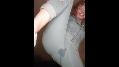 Fiery Redhead Teases in Denim Delight